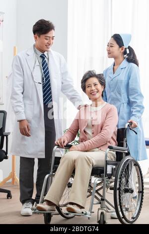 The doctor talked with elderly patients Stock Photo