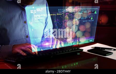 Man typing computer keyboard with futuristic hologram screen. Abstract concept of cyber security, computer protection, programming and internet safety Stock Photo