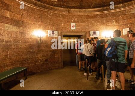 Visitors waiting to enter the lift/elevator up to the Eagle's Nest, Berchtesgaden, Bavaria, Germany. Stock Photo