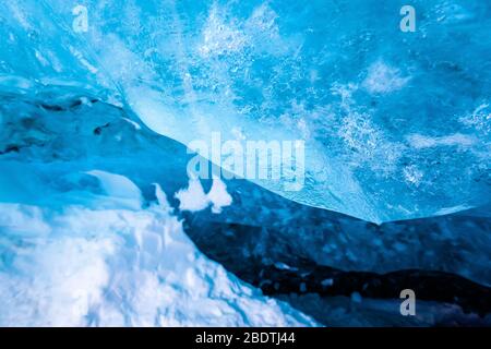 Close up of blue glacier ice in a glacier ice cave, Iceland Stock Photo