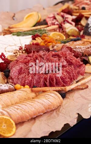 A close up of many different types of apitizers. Italian antipasti wine snacks set. Stock Photo
