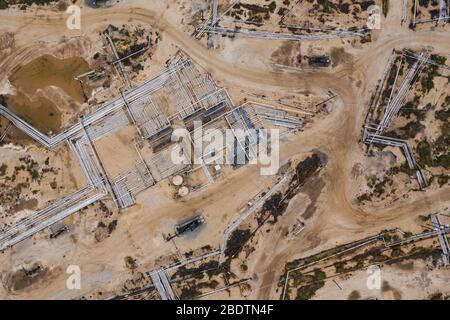 Oil fields in Kern California seem to stretch on forever Stock Photo