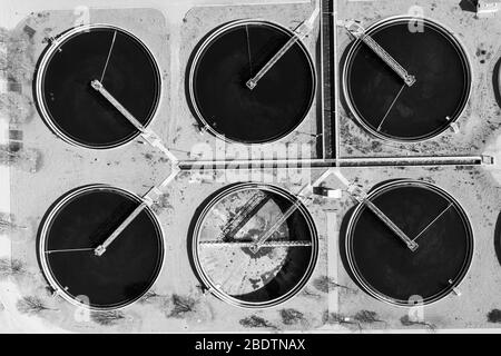 Water Treatment Tanks in Aerial Black and White Stock Photo