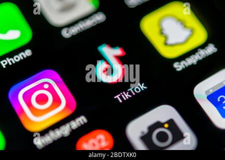 TikTok App, social network, app icon, display on display of mobile phone, smartphone, detail, full format Stock Photo