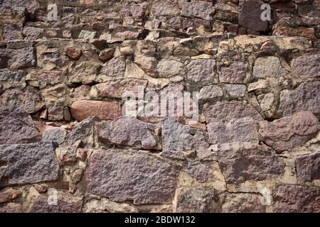 Concrete block bricks in stack for wall construction. Dirty Old Texture Stock Photo