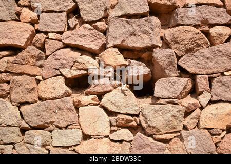 Pattern of Rough Grunge Vintage Stone Wall Texture Background.Dirty Old Texture Stock Photo