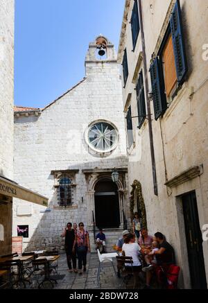 cafes and restaurants in the narrow streets of Dubrovnik's old town. Stock Photo