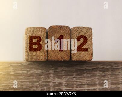 B12 on Wooden Blocks . Vitamin healthcare and healthy living concept Stock Photo