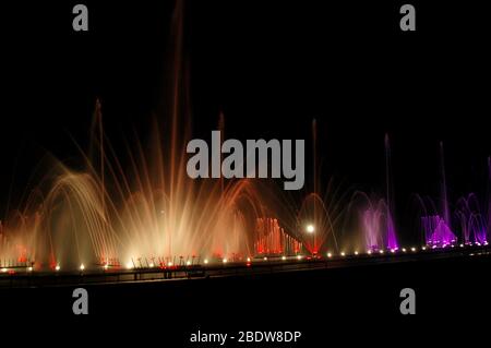 Musical fountain with colorful illuminations at night Stock Photo - Alamy