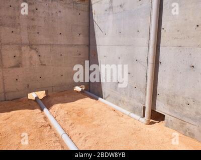 Sewage pipeline system of residential building under construction. Stock Photo