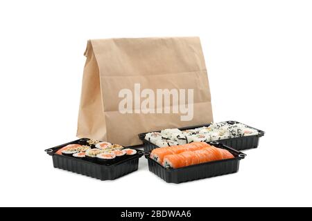 Containers with sushi isolated on white background. Food delivery Stock Photo