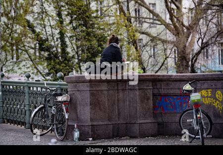 Berlin, Germany. 10th Apr, 2020. A woman is sitting on the admiral's bridge taking notes. Credit: Paul Zinken/dpa-zb-Zentralbild/dpa/Alamy Live News Stock Photo