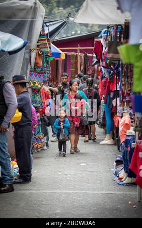 chichicastenango, Guatemala, 27th February 2020: mayan people at the traditional market selling and buying crafts Stock Photo