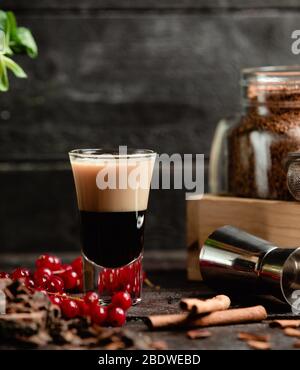 black drink in shot on the table Stock Photo