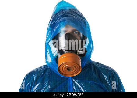 Man in gas mask and protective suit isolated on a white background. Virus Attack Protection Concept Stock Photo