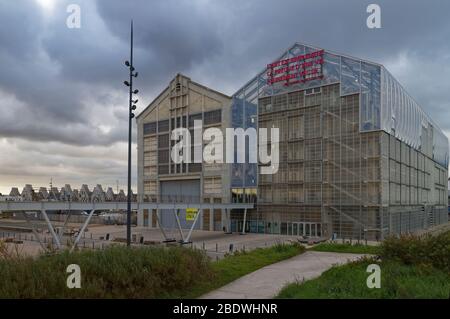 The Restored Warehouses of the Museum of Modern and Contemporary Art, behind the beach at the Port of Dunkirk. Stock Photo