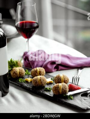 nuts rolls with red wine Stock Photo