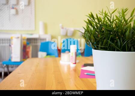 Blurred office background with copy space. Desk for design worker Stock Photo
