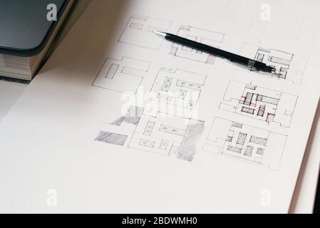 Architect Desk With Hand-drawn Plan Sketches And Pencil. Stock Photo