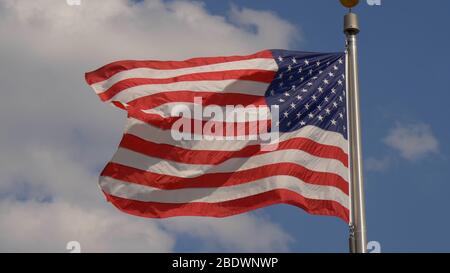 US Flag waving in the wind - NASHVILLE, UNITED STATES - JUNE 17, 2019 Stock Photo