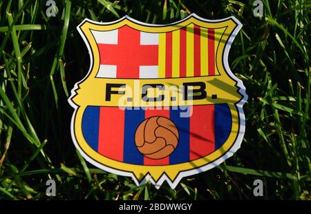 September 6, 2019 Istanbul, Turkey. The emblem of the Spanish football club Barcelona on the green grass of the football field. Stock Photo