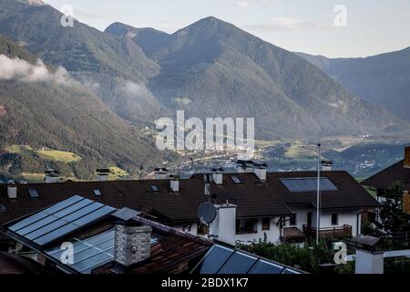 A view across the rooftops of the village of Sant Andrea, close to Bressanone in the South Tyrol region of Italy. Stock Photo