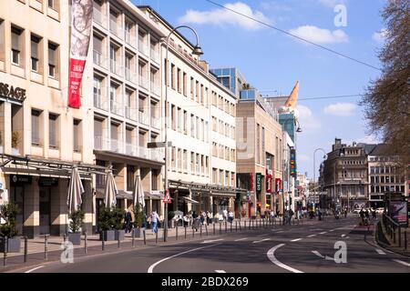 Coronavirus / Covid 19 outbreak, April 7th. 2020. Only few people and low traffic on Neumarkt, Cologne, Germany.  Coronavirus / Covid 19 Krise, 7. Apr Stock Photo