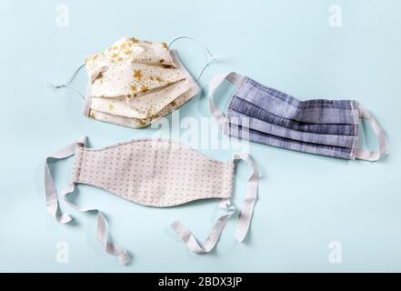 Homemade various fabric color, shape and size face masks for virus protection. Stock Photo