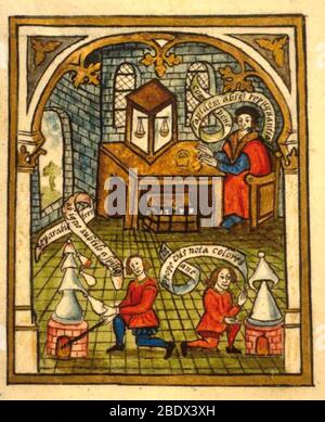 An alchemist is seated at a table with bowl and scales, with two kneeling figures attending to the furnaces, c. 1477. An illustration from the Ordinal of Alchemy by English poet and alchemist Thomas Norton (c.1433-c.1513). The Ordinal is an alchemical poem of around 3000 lines, famous for having the earliest known illustration of a scientific balance, a balance enclosed by glass to prevent drafts. It can be seen on the table in this image. Stock Photo
