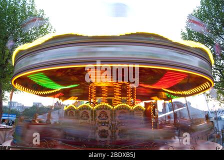 Golden Carousel Spinning Motion Speed Fast Movement Merry-Go-Round Fun Fair Fairground Jubilee Gardens, Lambeth, London