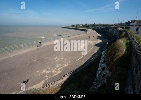 People ride bikes near Margate Beach, Kent, during the Easter bank holiday weekend, as the UK continues in lockdown to help curb the spread of the coronavirus. Stock Photo