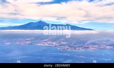 Aerial view of Mount Teide and the coast of Tenerife the largest of the Spanish Canary Islands Stock Photo
