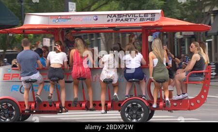 Party bike in the streets of Nashville - NASHVILLE, UNITED STATES - JUNE 17, 2019 Stock Photo