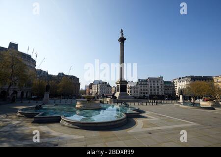 London, U.K. - 10 Apr 2020: A deserted Trafalgar Square on Bank Holiday Easter Friday during the Covid-19 coronavirus lockdown. Stock Photo