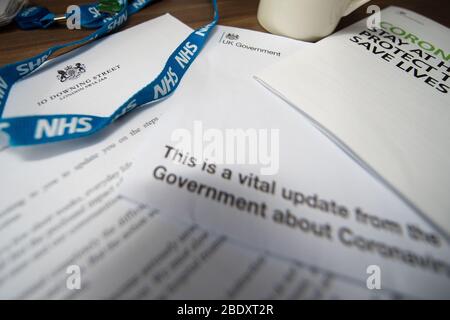 Glasgow, UK. 10th Apr, 2019. Pictured: Letter from the UK Prime Minister Boris Johnson sent to all UK households which includes a Government Information Leaflet, “CORONAVIRUS. STAY AT HOME. PROTECT THE NHS. SAVE LIVES.” The letter opens with, “I am writing to you to update you on the steps we are taking to combat coronavirus.” “In just a few short weeks, everyday life in this country has changed dramatically. We all feel the profound impact of coronavirus not just on ourselves, but our loved ones and our communities.” Credit: Colin Fisher/Alamy Live News