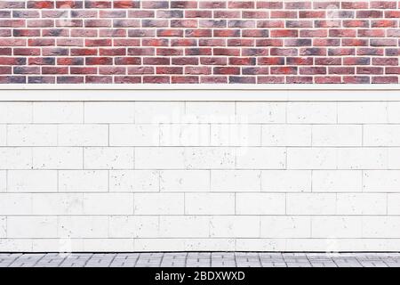 Red brick and stone wall with gray stone floor background. Stock Photo
