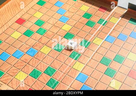 Moscow, Russia - April 09, 2020: Scrabble game letter A on the game field. Stock Photo