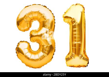Number 31 thirty one made of golden inflatable balloons isolated on white. Helium balloons, gold foil numbers. Party decoration, anniversary sign for Stock Photo