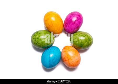 Several easter eggs in different colors isolated on white background Stock Photo