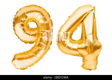 Number 94 ninety four made of golden inflatable balloons isolated on white. Helium balloons, gold foil numbers. Party decoration, anniversary sign for Stock Photo