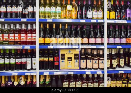 SEPTEMBER 22, 2019-BAGUIO CITY PHILIPPINES : Different kinds of wine stacked on a department store shelf for sale. Stock Photo