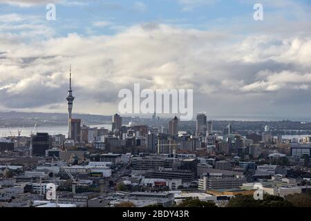 Auckland, New Zealand - Jul 03, 2017: A general view of Auckland and the Sky Tower from Mount Eden looking towards North Shore Stock Photo