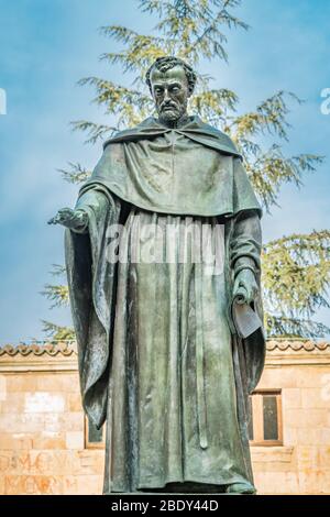 Salamanca, Spain - February 3, 2019 : Statue of Fray Luis de Leon at Patio de escuelas in front of Salamanca University. UNESCO World Heritage Site Stock Photo