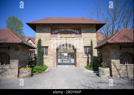 07 April 2020, Baden-Wuerttemberg, Cleebronn: The closed entrance of the Tripsdrill theme park. During the easter holidays the park is actually very well visited. To slow down the spread of the coronavirus, amusement parks are also closed. Photo: Sebastian Gollnow/dpa Stock Photo