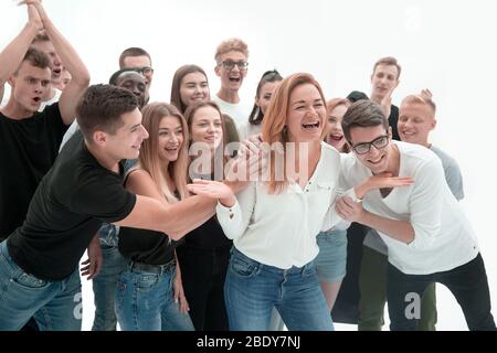 group of young people supporting their happy leader Stock Photo