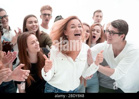 group of young people supporting their happy leader Stock Photo