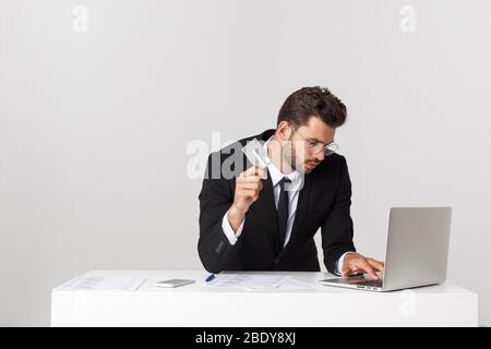 business man hold credit card in pocket isolated white background,studio concept. Stock Photo