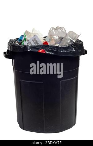 Vertical shot of a full black garbage bag in a plastic garbage can with the top open.  White background.  Copy Space. Stock Photo