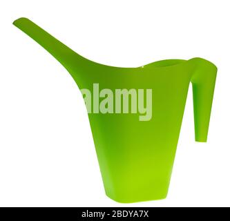 Horizontal close-up shot of a green plastic watering can.  White background.  Copy space. Stock Photo
