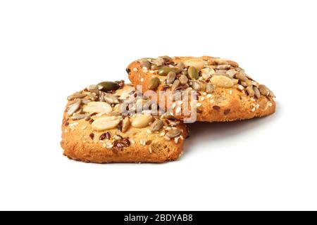Cookies with nuts, seeds and sesame isolated on white background Stock Photo